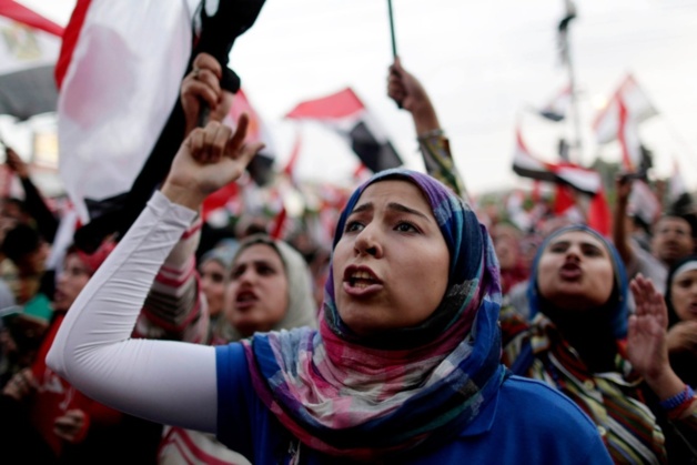 Crédit Photo -- Hassan Ammar/AP Crédit Photo -- Hassan Ammar/AP
