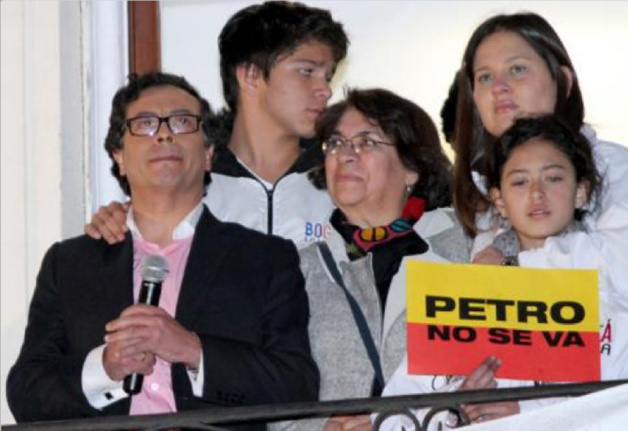 Petro and his family standing at the balcony of the town hall of Bogota, addressing his supporters © AFP