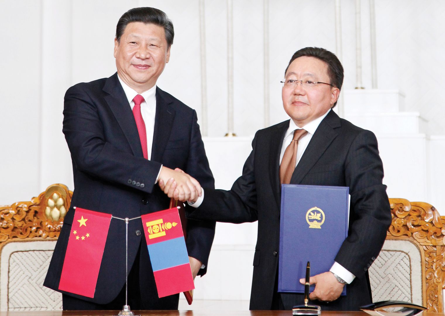 Xi Jinping et Tsakhiagiyn Elbegdorj - Crédit Reuters