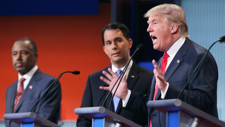 Crédit Chip Somodevillia / Getty Images - Ben Carson, Scott Walker et Donald Trump lors d’un des débats de la primaire républicaine