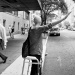 Jen hailing a cab outside of hospital